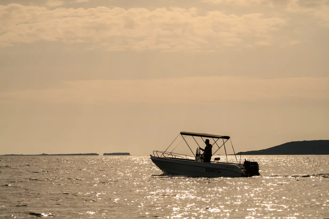 Sunset silhouette on the water